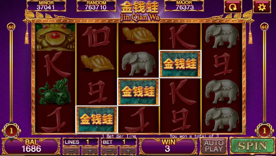 Jin Qian Wa reels with three gold 金钱蛙 scatter tiles on reels 2, 3 and 4 and a win of 3